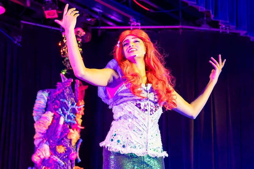 Students perform onstage